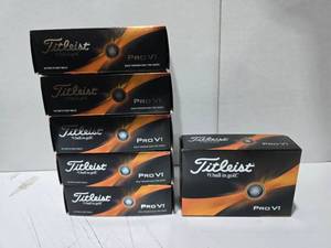 lot 513 image: Titleist Pro V1 Golf Balls.  6 Golf Balls Per Box  QUANTITY 6 BOXES  BID IS TIMES THE QUANTITY