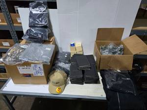 lot 599 image: Large Lot of Misc Smith Bits Items.  Includes Shirts, Jackets, Hoodies, Hats, Notebooks, Ornaments & Drill Bit Koozies