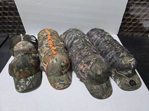 lot 584 image: Lot of Outdoor Cap Camo Hats.  Approx 12 Hats Per Pack  QUANTITY 6 PACKS  BID IS TIMES THE QUANTITY