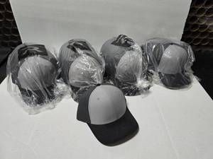 lot 620 image: Richardson 312 Solid Twill Trucker Hat, GreyCharcoalBlack.  Approx 12 Hats Per Pack  QUANTITY 4 PACKS  BID IS TIMES THE QUANTITY