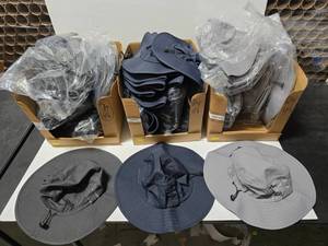 lot 622 image: Pacific Headwear 1946 Manta Ray Boonie Sun Hat.  Approx 12 Hats Per Pack.  Charcoal (4 Packs), Navy (4 Packs) & Gray (4 Packs)  TOTAL QUANTITY 12 PACKS  BID IS TIMES THE QUANTITY SO YOU ARE BIDDING PER PACK