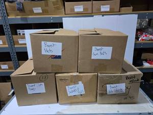 lot 648 image: 5 Boxes of Misc Boost Mobile Promotional Products, Hats, Shirts & Jackets.  SEE PICS FOR STYLES