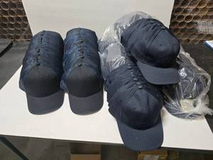 lot 686 image: Lot of Port Authority Navy Hats.  Approx 12 Hats Per Pack.  Includes C818 Shock Blue (4 Packs) & C833 Navy (6 Packs)  QUANTITY 8 PACKS TOTAL  BID IS TIMES THE QUANTITY