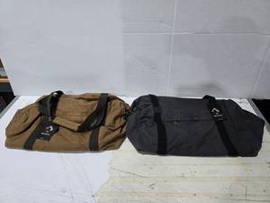 lot 695 image: Dri-Duck Weekender Canvas Duffle Bag.  1 Brown & 1 Charcoal  QUANTITY 2 BAGS  BID IS TIMES THE QUANTITY