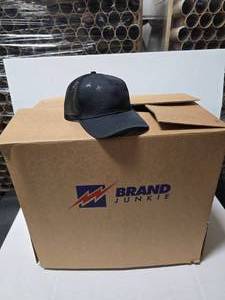 lot 717 image: Outdoor Cap USA-750M Black Debossed American Flag Hats.  Approx 12 Hats Per Pack.  QUANTITY 10 PACKS  BID IS TIMES THE QUANTITY