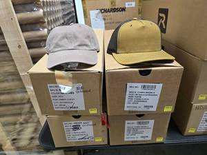 lot 824 image: Richardson 112 Snapback Mesh Trucker Hat, Hawthorne Split WhiskeyBrown & Richardson 320 Driftwood.  Approx 24 Hats Per Box  QUANTITY 4 BOXES  BID IS TIMES THE QUANTITY
