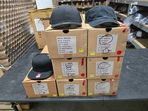 lot 825 image: Richardson 320, Richardson 112 & Richardson 511 Hats.  Approx 24 Hats Per Box  QUANTITY 7 BOXES  BID IS TIMES THE QUANTITY