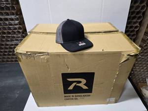 lot 836 image: 6 Boxes of Richardson 112 Snapback Mesh Trucker Hat, BlackCharcoal. Approx 24 Hats Per Box