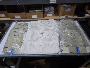lot 855 image: Mojo  Sportswear Fishing Shirts.  Tan (Qty 13) & White (Qty 7).  SEE PICS FOR SIZES & COUNTS