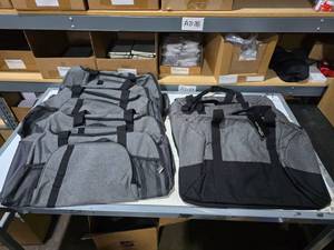 lot 859 image: Lot of 8 Misc Bags & Totes.  Included 5 Grey Duffle Bags & 3 Ashbury Bags