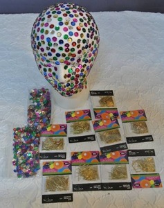 lot 61 image: Styrofoam head, and crafting pins and sequins partially complete