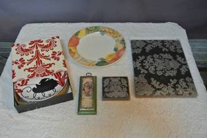 lot 69 image: Placemats and matching coasters Christmas plates and more see photo
