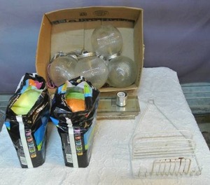 lot 70 image: hand blown orb chandelier made by BootsNGus and 2 packs of pads both open packs and more the stock pic of the chandelier is what is in the box