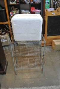lot 102 image: Metal shelf and styrofoam cooler
