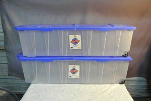 lot 111 image: 2 long rolling carts with wheels on one side and handles on the other lids are in 2 pieces see pictures