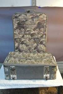 lot 112 image: Two matching and rollable suitcases