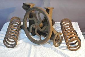 lot 120 image: antique late 1800s wall mount cast iron drill press and iron springsspirals would be perfect for separating books or records would be good for industrial interior designing