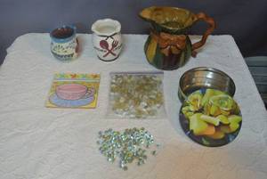 lot 144 image: Vintage Hand Painted Jarritos Folk Pottery Art Mug  Tijuana Hibiscus Flowers , kitchen catcher vase made in Japan, decorative pitcher, marbles and decorative coaster made in Italy and so much more see pictures