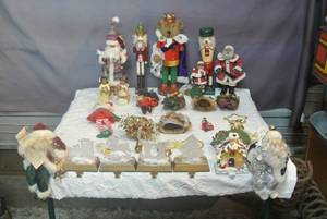 lot 147 image: Tote full of Christmas decor please look at all pictures some of the nutcrackers in the back need repairs