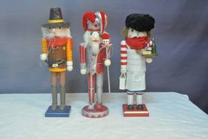 lot 154 image: 3 nutcrackers about 14 inches tall see all pictures