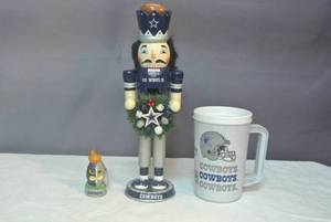 lot 156 image: Cowboys nutcracker about 14 inches tall and ornament and cup see all pictures