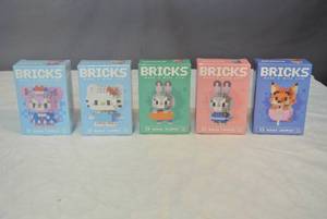 lot 163 image: 5 unopened boxes of bricks not too soon to start shopping for Christmas