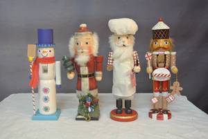 lot 180 image: 4- nutcrackers about 14 inches tall
