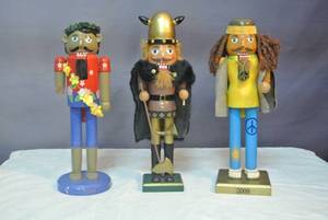 lot 188 image: 3- nutcrackers they  range from about 15 inches tall to 14 inches