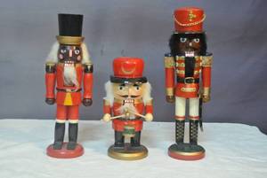 lot 192 image: 3- nutcrackers they  range from 14 inches tall to about 9 inches
