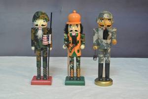 lot 195 image: 3- army nutcrackers about 10 inches tall