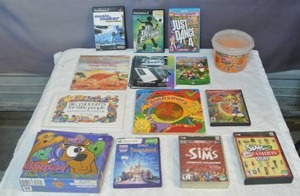 lot 207 image: PlayStation 2 games wii game Sims games books and bucket of slime and more see pictures