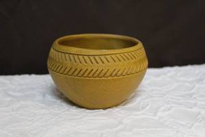 lot 275 image: mustard yellow color vintage Alabama- Coushatta Tribes bowl, signed about opening diameter is about 4 inches and a little over 3 inches high