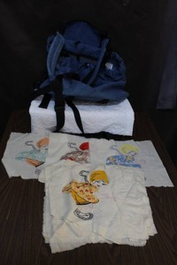 lot 281 image: Denim dog career and hand embroidered patches ready for quilt making.