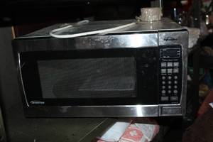 lot 282 image: Panasonic  high voltage microwave with a glass turntable.