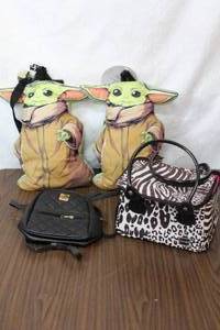 lot 298 image: Yoda backpacks small black backpack and a makeup bag