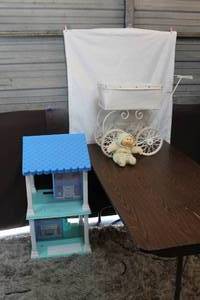 lot 300 image: doll stroller and doll house and a cabbage patch doll