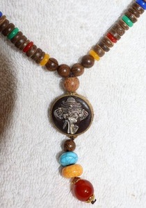 lot 155 image: Jewelry, animal themed Wood  beaded necklace with elephant pendant