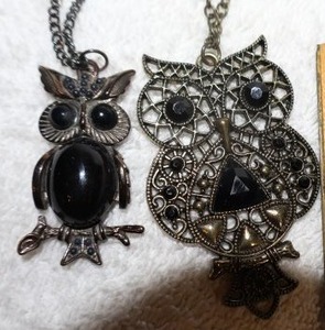 lot 159 image: Jewelry, animal themed owl with black bead pendant necklaces