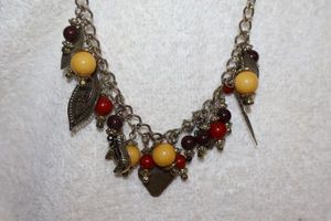 lot 166 image: Jewelry, animal themed multi charm bead necklace