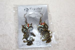 lot 169 image: Jewelry, animal themed antiqued gold tone owl earrings