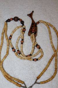 lot 174 image: Jewelry, animal themed wood bead necklace with giraffe bead