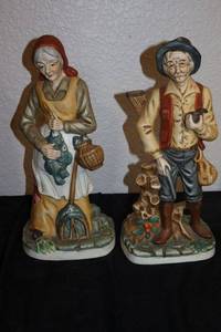 lot 179 image: Old farmer couple ceramic figurines