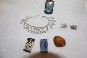 lot 122 image: Jewelry, animal themed handmade pottery pendants, and cat jewelry