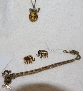 lot 126 image: Jewelry, animal themed charm bracelet, elephant earrings, bee and yellow bead necklace