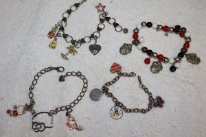 lot 186 image: Jewelry Charm bracelets (one with Hello Kitty charms)