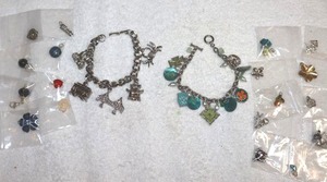 lot 188 image: Jewelry Charm bracelets plus extra charms