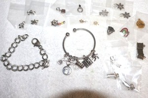 lot 192 image: Jewelry charms bracelets with extra charms