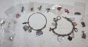 lot 195 image: Jewelry charms bracelets with extra charms