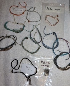 lot 196 image: Jewelry Park Lane charmpendant plus Pura Vida bracelets