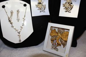 lot 220 image: Jewelry Gold tone and rhinestone necklace and earrings set plus brooch pins